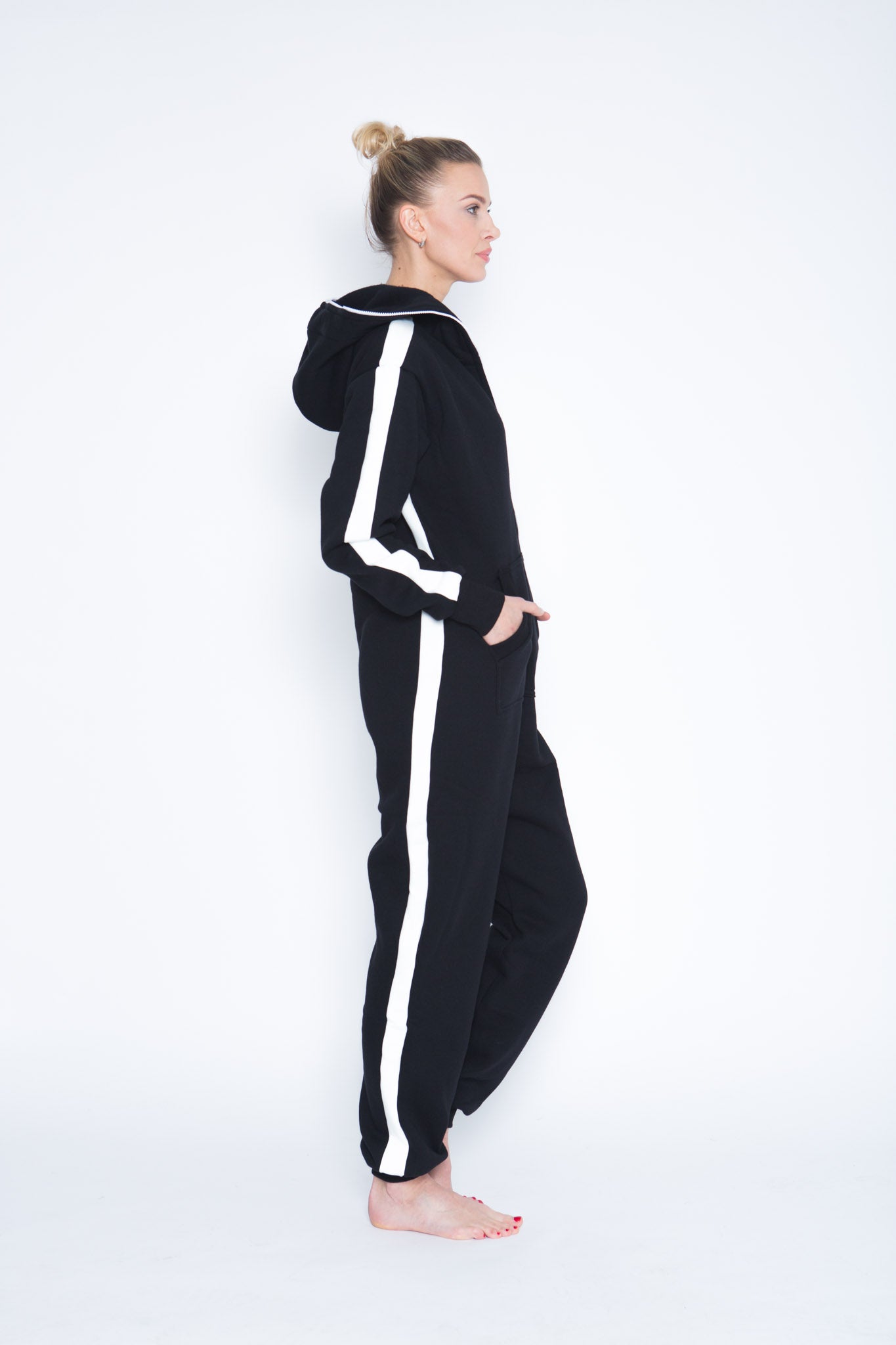 Sofa Killer black onesie with white vertical lines Sofa Killer